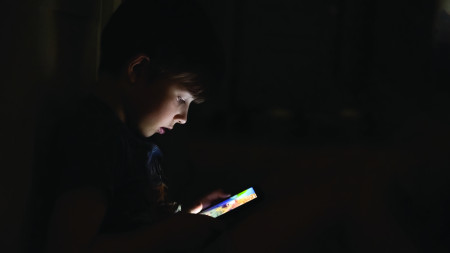 Child on Smartphone in the Dark