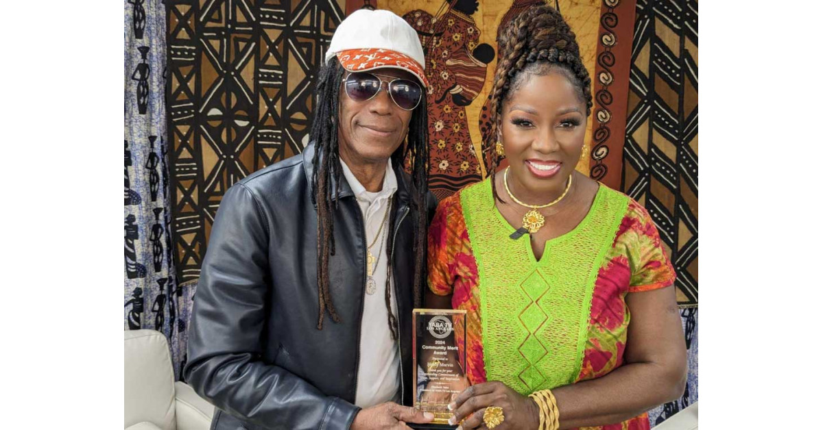 Junior Marvin Receives Award From Yaba TV Los Angeles During an Exclusive Interview on the Upcoming Bob Marley Movie