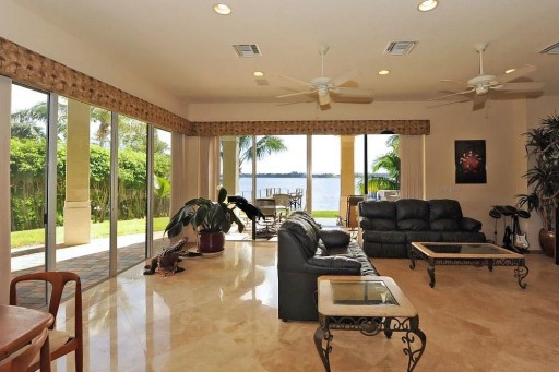 Direct Intracoastal Waterfront Property with Private Beach in Palm Beach under $1.5M