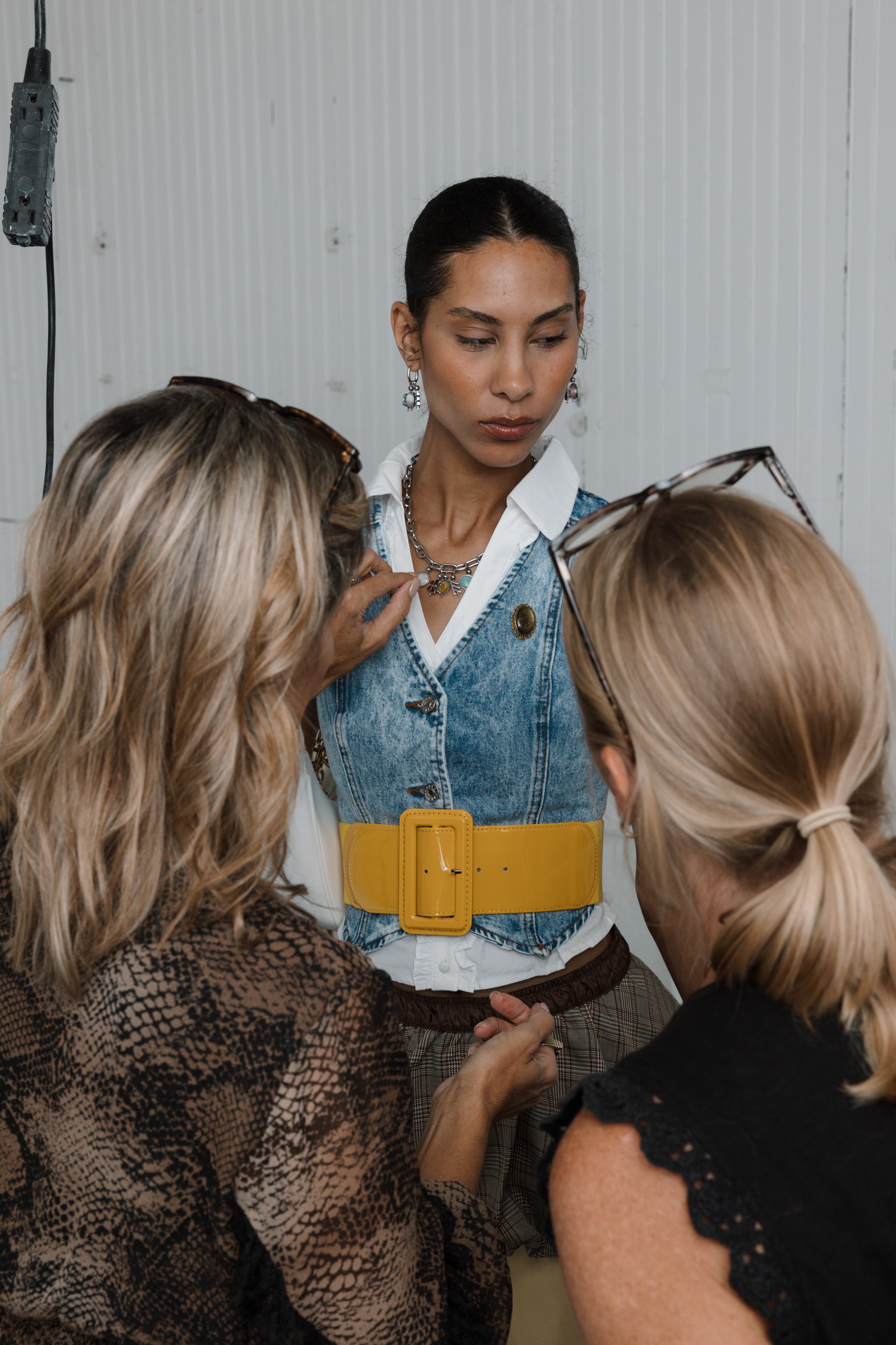 Final fitting for FACETS by CONQUERing, Paris Fashion Week.