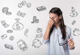 Woman Stressed by Finances, Including Student Loans