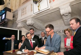 Inspire CEO, Robert Netzly, signing NYSE bell ringer book