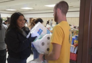 Bringing supplies to shelters for evacuees