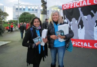 Volunteers distributing copies of Truth About Drugs booklets at a recent All Blacks rugby game