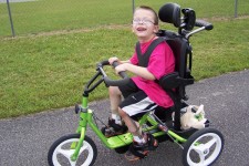 A previous winner of the adaptive bike giveaway 