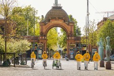 Scientology Volunteer Ministers pass by Copenhagen's famous Tivoli amusement park en route to distributing Stay Well booklets in shops throughout the city