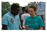 Say No to Drugs Association volunteer in Brussels introduces The Truth About Drugs initiative to one of athletes participating in the Navétane 2016 Football Tournament.