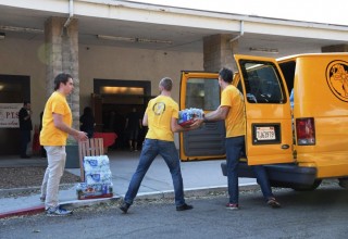 Volunteer Ministers deliver supplies to evacuation center