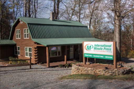 International Minute Press Franchise Business in Winston-Salem Relocates to Uniquely Designed Log Cabin Property Fostering Increased Foot Traffic and Sales Growth
