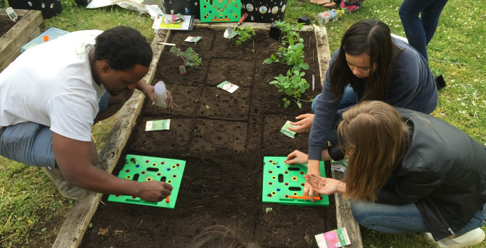Friends Plant a Garden Using Seeding Square