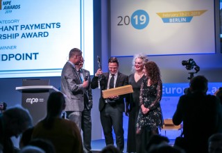 Handpoint collecting the Best Payment Partnership Award