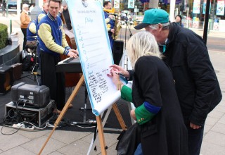 The team was raising funds for Drug-Free World activities in Sussex, such as this drug-free pledge drive in Crawley, featuring the Jive Aces, UK's No. 1 Jive & Swing band.