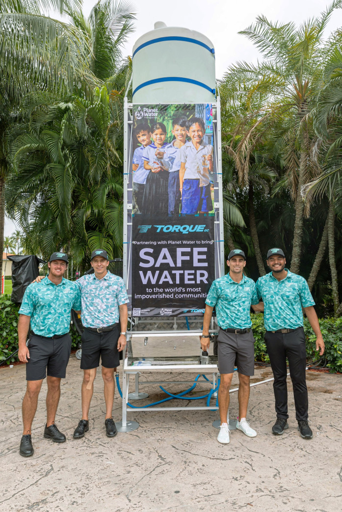 Team Torque GC members with a Planet Water Foundation AquaTower