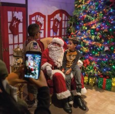 Santa listens to the children's wishes at the 24th annual Winter Wonderland in downtown Clearwater, Florida.