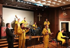 The Jive Aces Swing into Health concert at the Nashville Church of Scientology World Health Day Concert. Church pastor Rev. Brian Fesler (left) joins them on banjo. 