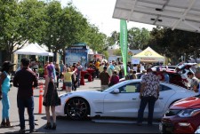 Energy Independence Celebration attendees view electric vehicle showcase