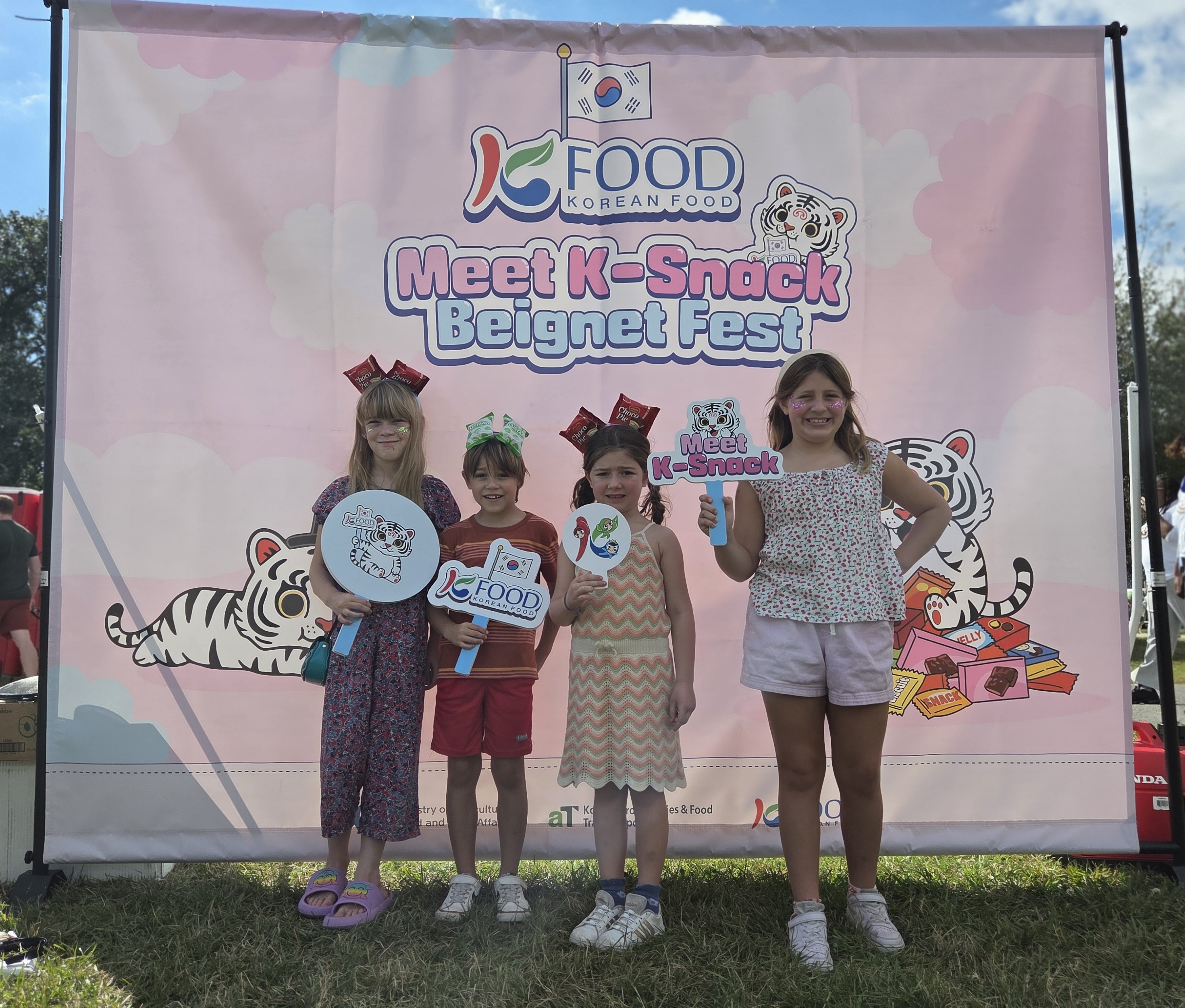 Children Enjoy K-Snack Photo Zone at Beignet Fest