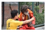 Scientology Volunteer Minister provides an assist to a devotee in Kathmandu