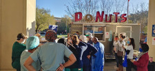 The Simply Done Donuts Wagon serves its trademark mini donuts and artisan coffee to nurses and staffers from Emory Johns Creek Hospital 