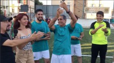 Accepting the trophy for the Drug-Free World tournament in Cagliari