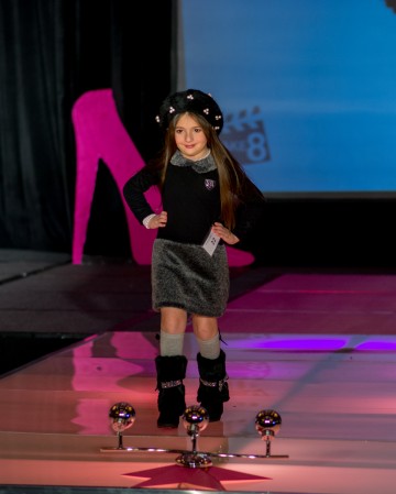 East Coast Starz Model walking the runway in a Polish inspired outfit. 