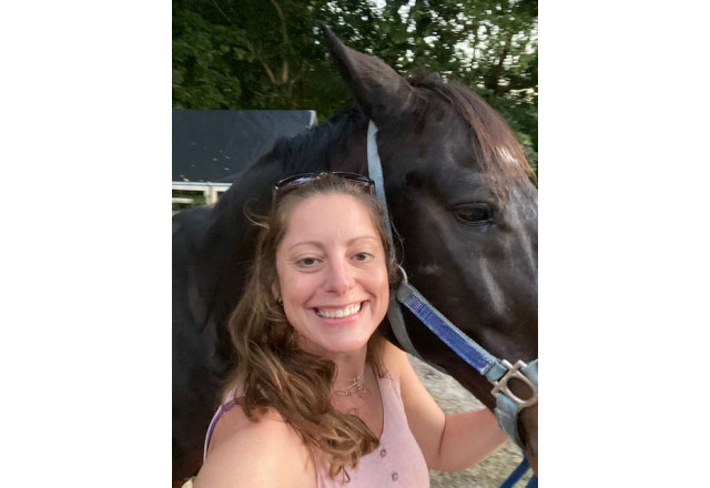 Bricole Reincke Poses with her Horse