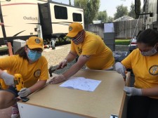 When the RV a family lived in was destroyed by the fire, Volunteer Ministers helped put together furniture for their new home.