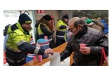PRO.CIVI.CO.S. helping at a relief station at the Porta Nuova metro station in Torino, Italy.