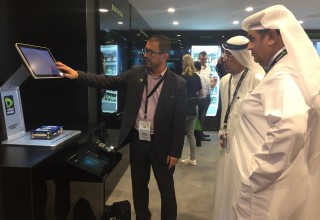 Etisalat Chairman Essa Mohamed Al Suwaidi and CEO Saleh Abdullah Al Abdooli are experiencing the AI checkout machine