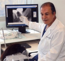 Dr. Farnoosh Consults with One of His Patients
