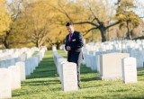 Jersey Memorial Group Principal David Hernandez, Jr. takes a moment to reflect at the grave of a NJ serviceman while visiting Arlington National Cemetery.