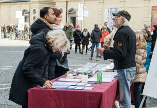 Visitors to the booth left with copies of the What are Human Rights? booklet and signed a petition calling on the country to mandate human rights education.