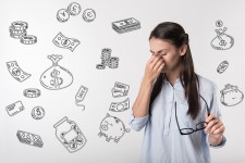 Woman Stressed by Finances, Including Student Loans