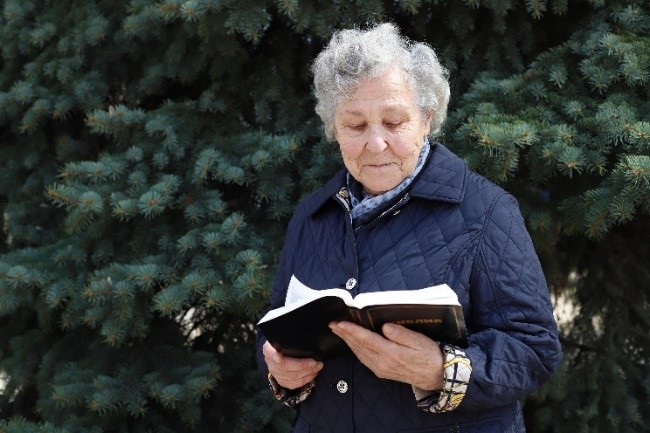 EEM Woman With Bible