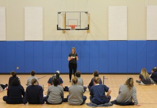 Comedian Muffy performs for inmates