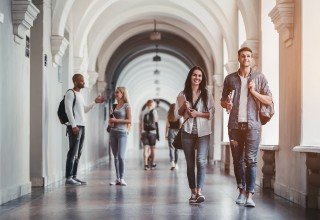 Students Walking in a College Corridor