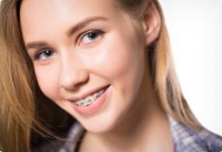 Schedule a Free consultation with the orthodontist to learn about Invisalign