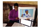 Ernie Banks with print #14 of Dan Duff's "Mr. Cub"