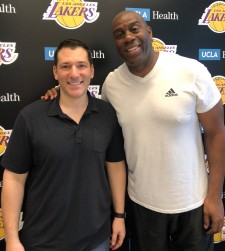 PPC President, Kyle Bell, with Magic Johnson