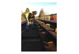 Rail Worker Performing Track Maintenance