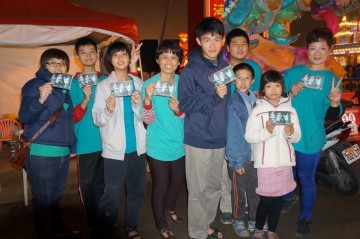 Volunteers from the Taiwan's Drug- Free World Association, invited to the Chia-Yi's Shin-Gong Fong-Tian Temple for the temple's 125th anniversary celebration