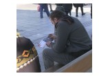 In Athens, a man engrossed in the copy of the Truth About Drugs booklet he received from volunteers from the Church of Scientology Athens at their drug prevention rally January 15, 2017, in Syntagma Square.