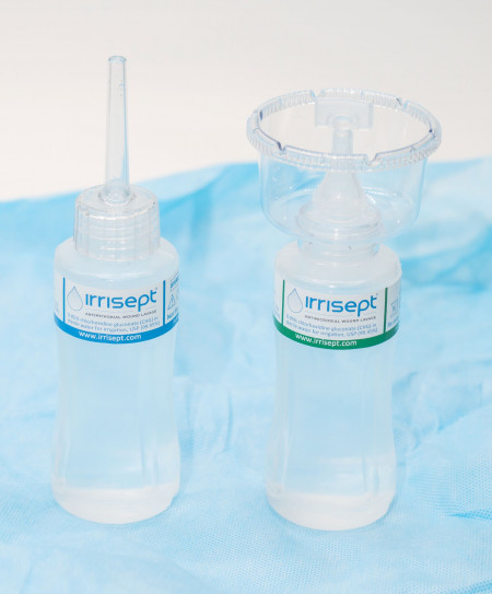 New bottles of Irrisept Antimicrobial Wound Lavage