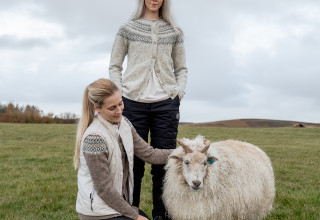 Icelandic girls with an Icelandic sheep