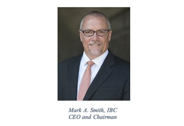 A person wearing a suit and tieDescription automatically generated with medium confidence