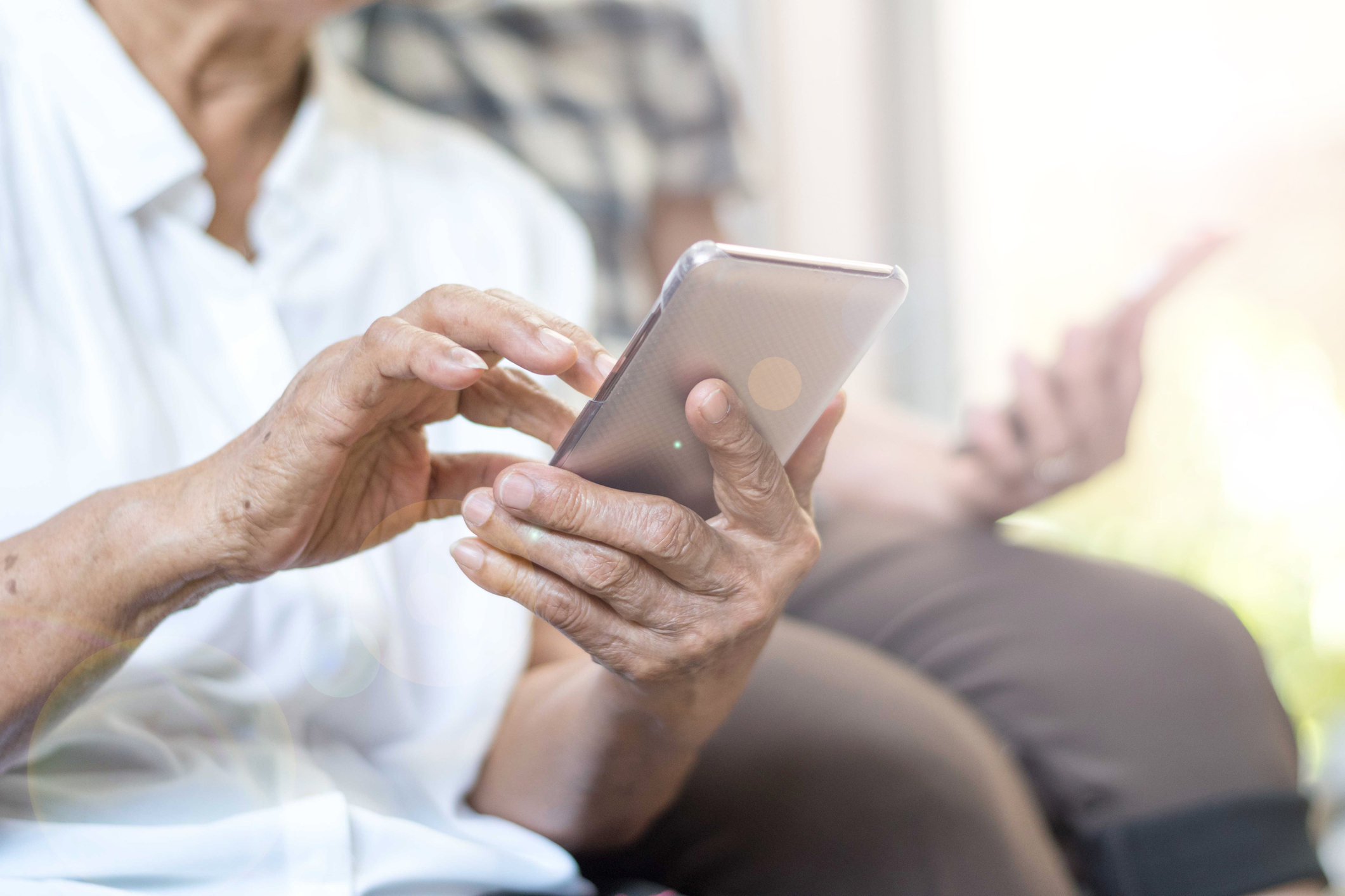 Elderly Patient on Smartphone