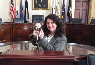 Rudi Taylor with Harley during a congressional hearing in Washington, DC