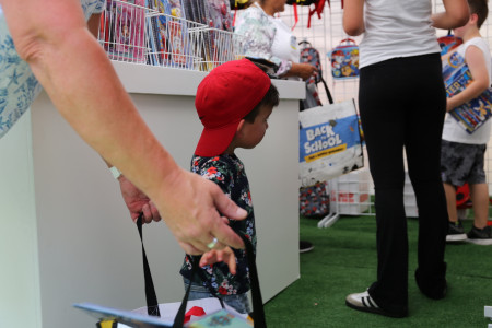 Boy Shopping at Back-to-School Event