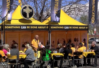 After lunch, the Scientology Volunteer Ministers delivered their "Answers to Drugs" seminar at their bright yellow tent.