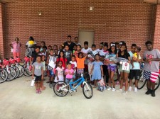 Robert Alford and 30 children with their new woom bikes